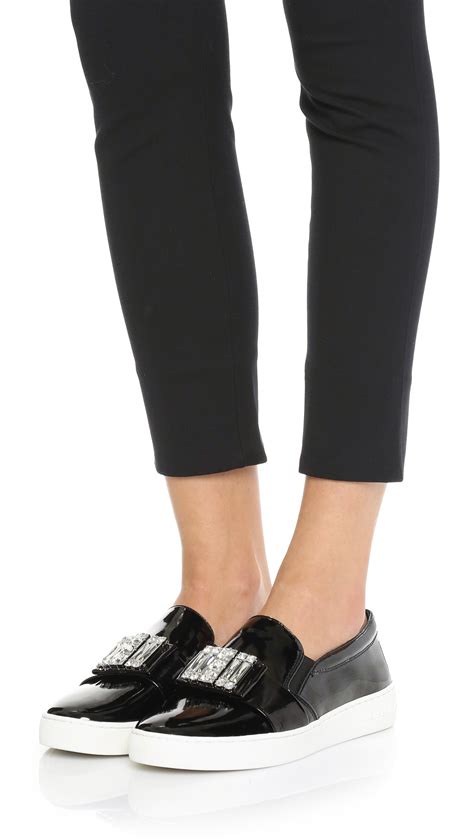 black michael kors slip on sneakers|michael kors heeled sneakers.